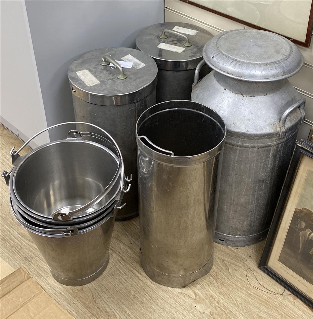 Three stainless steel cylindrical food containers, a galvanised steel churn and four stainless steel buckets